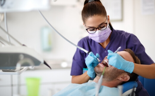 Dental team member offering quality dentistry using quality materials