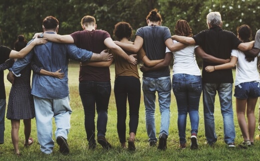 Group of people standing together in a line