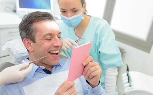 patient getting dental crown in Monroe