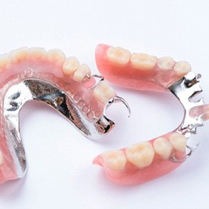 Dentist handling a full denture