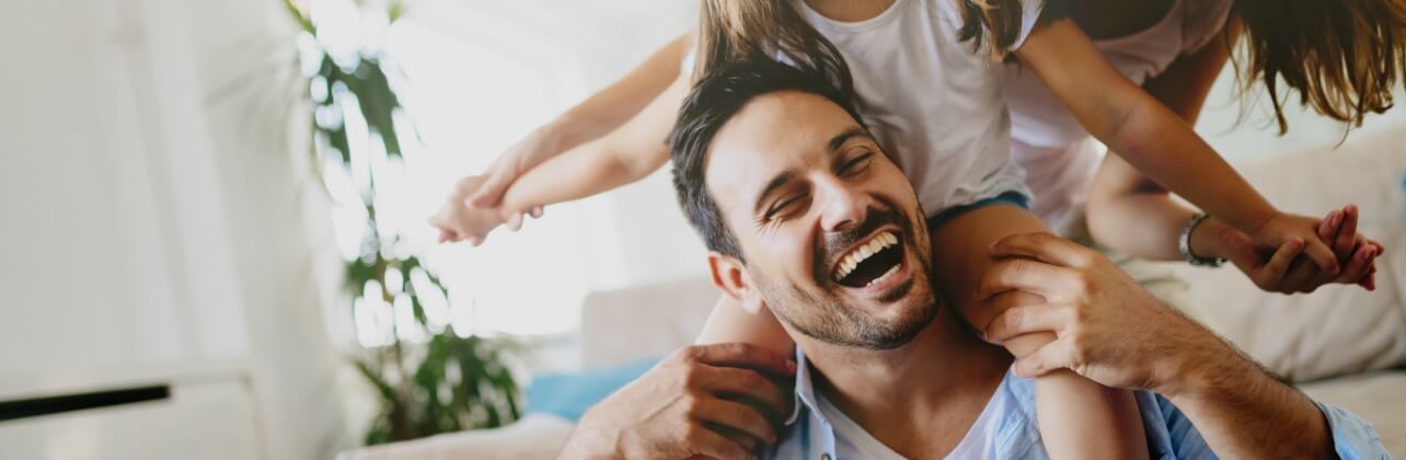 Man with healthy smile after periodontal gum disease treatment